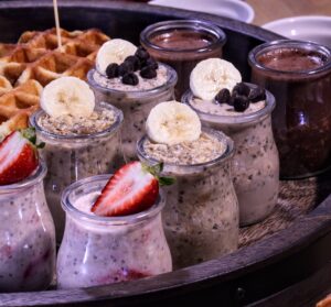 Glass jars with oats and fruit